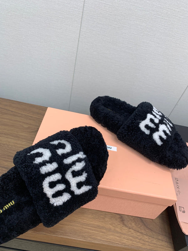 Miu slippers Black With White Text Pure Wool