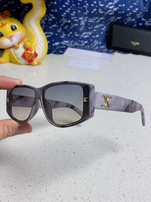 TRIOMPHE SUNGLASS 566217 IN MARBLED EFFECT ACETATE