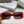 MONTAIGNE SUNGLASS 571592 IN RED ACETATE TEXT LOGO