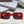 MONTAIGNE SUNGLASS 571592 IN RED ACETATE TEXT LOGO