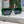 MONTAIGNE SUNGLASS 571594 IN GREEN ACETATE TEXT LOGO
