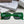 MONTAIGNE SUNGLASS 571594 IN GREEN ACETATE TEXT LOGO