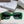 MONTAIGNE SUNGLASS 571594 IN GREEN ACETATE TEXT LOGO