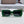 MONTAIGNE SUNGLASS 571594 IN GREEN ACETATE TEXT LOGO
