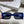 MONTAIGNE SUNGLASS 571595 IN BLUE ACETATE TEXT LOGO