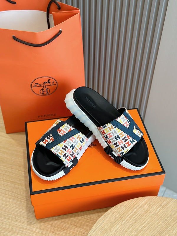 HM SLIPPERS BLACK AND WHITE MONOGRAM CANVAS