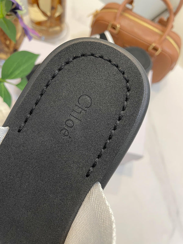 CHLOÉ WOODY WEDGE SANDALS IN BLACK MIX WHITE CANVAS WITH RUBBER SOLE