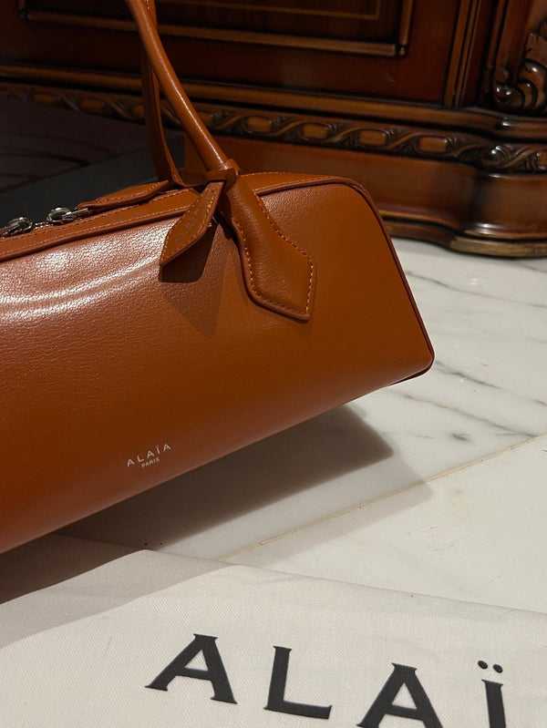 LE TECKEL MEDIUM BAG 33 IN BRONZE ORANGE GOATSKIN