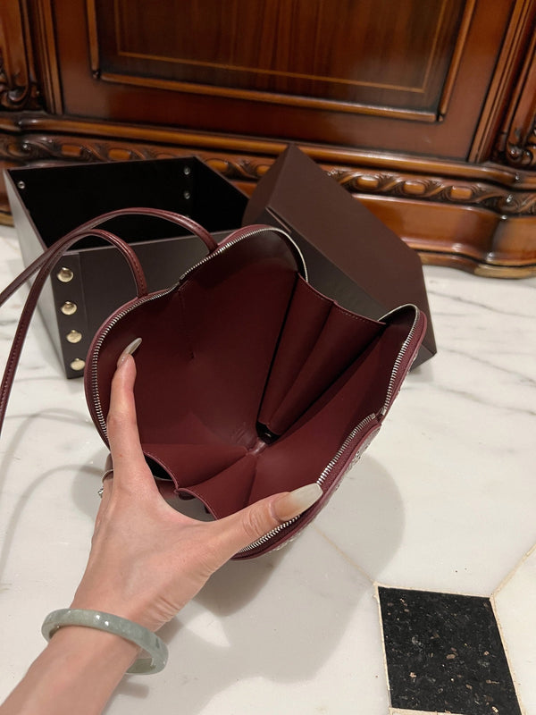 LE COEUR BAG 21 IN BURGUNDY RED STUDDED CALFSKIN