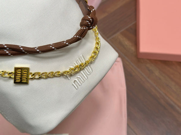 DRAWSTRING BUCKET BAG 21 IN WHITE CANVAS GOLD HARDWARE