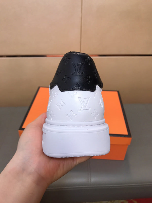 LV TRAINER SHOES IN WHITE AND BLACK CALFSKIN