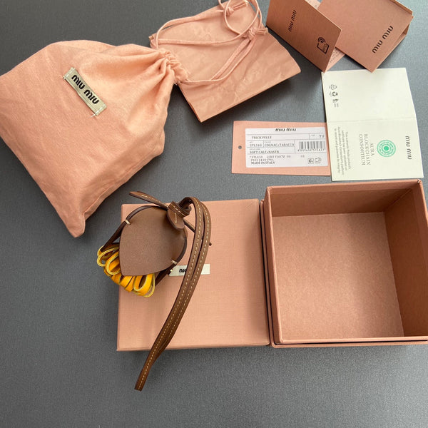 Ciondolo per borsa in pelle marrone arancione 240346