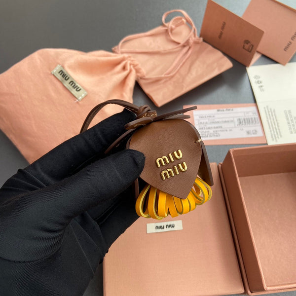 Ciondolo per borsa in pelle marrone arancione 240346