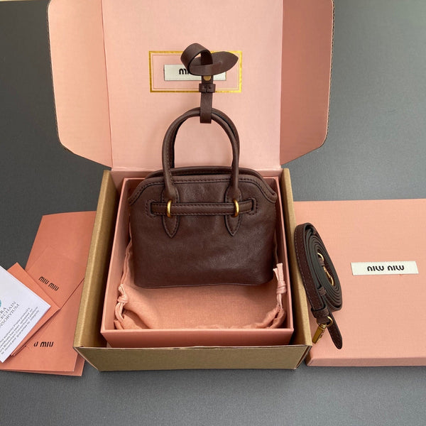 BORSA ADVENTURE 13 IN PELLE DI VITELLO LUCIDA MARRONE CRATERE