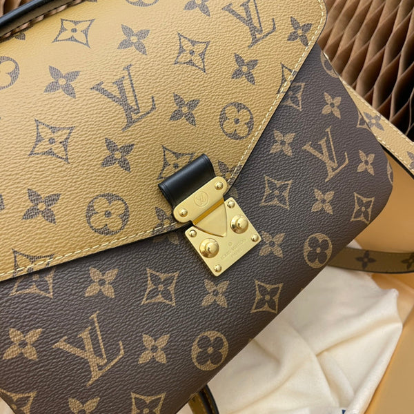 pochette metis 25 monogram reverse canvas