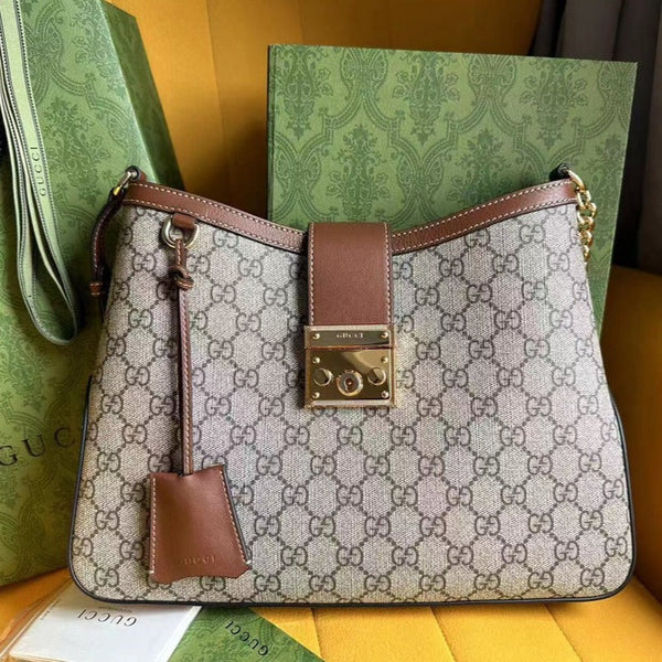 BORSA A TRACOLLA GG PADLOCK 32 IN TELA BEIGE E PELLE DI VITELLO MARRONE