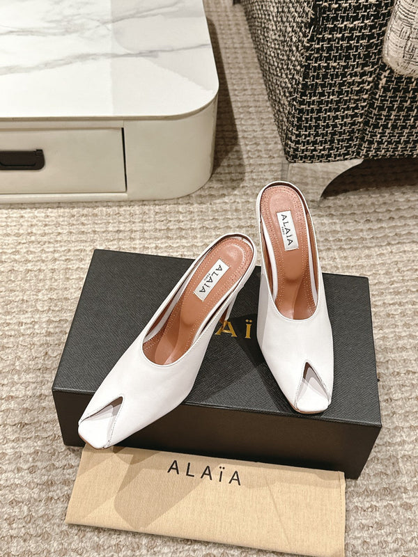 MULES GIOIELLO ALAIA SPIKE IN PELLE DI VITELLO BIANCA
