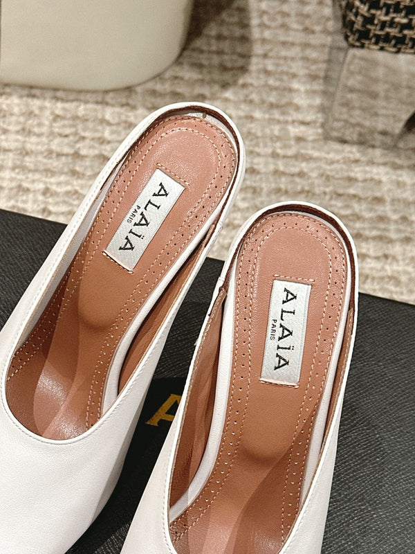 MULES GIOIELLO ALAIA SPIKE IN PELLE DI VITELLO BIANCA