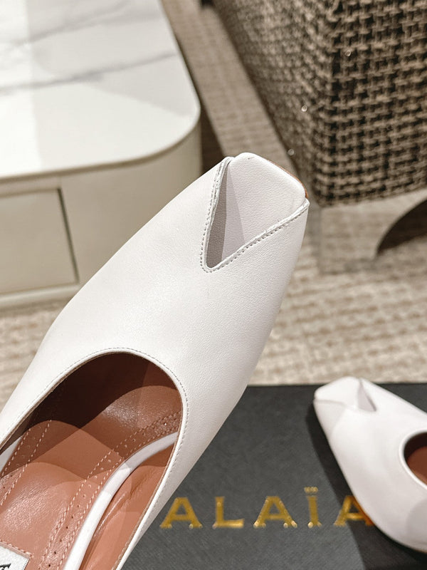 MULES GIOIELLO ALAIA SPIKE IN PELLE DI VITELLO BIANCA