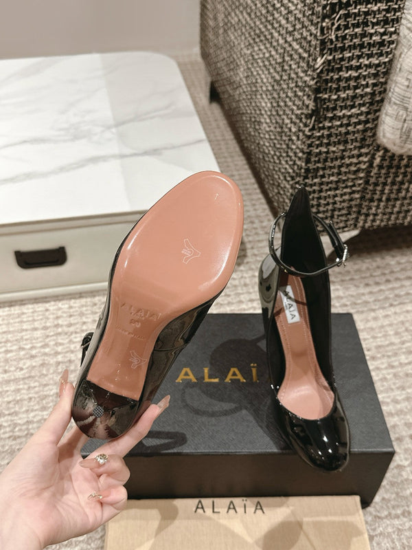 ALAIA ROUND-TOE HIGH HEELS 10 CM IN BLACK CALFSKIN
