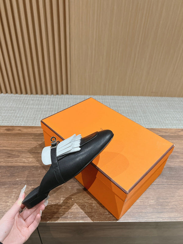 OZ Mule con frange nere/bianche