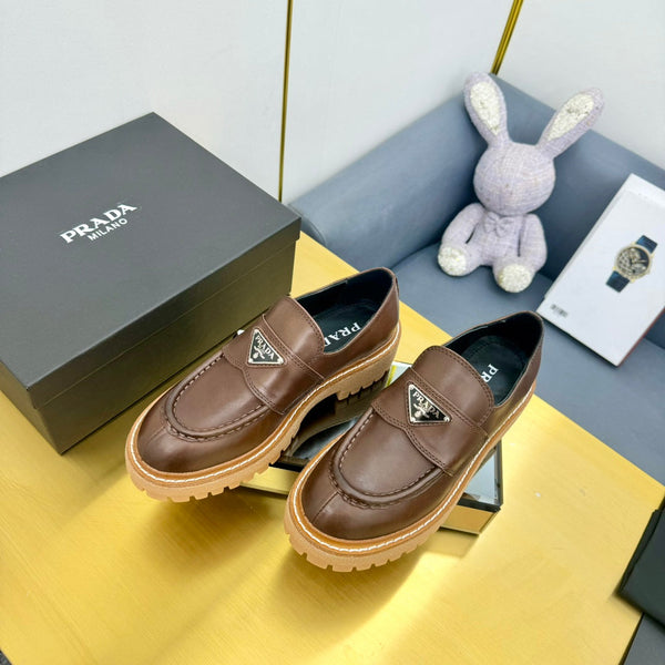 LOAFER WITH TRIANGLE LOGO IN CHOCOLATE BROWN CALFSKIN