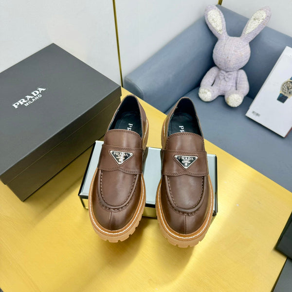 LOAFER WITH TRIANGLE LOGO IN CHOCOLATE BROWN CALFSKIN