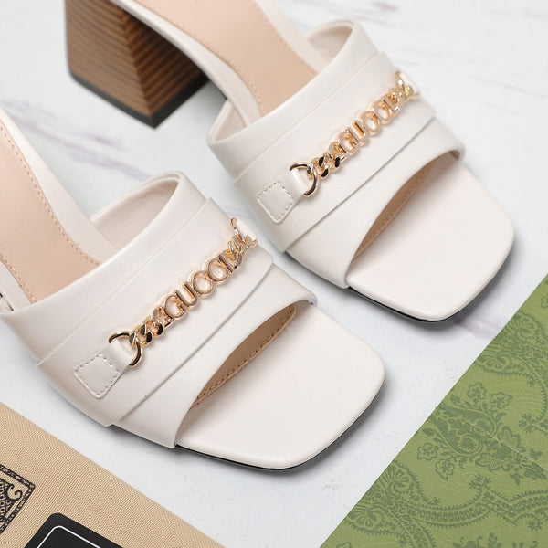 Ciabatte con tacco alto GG bianche