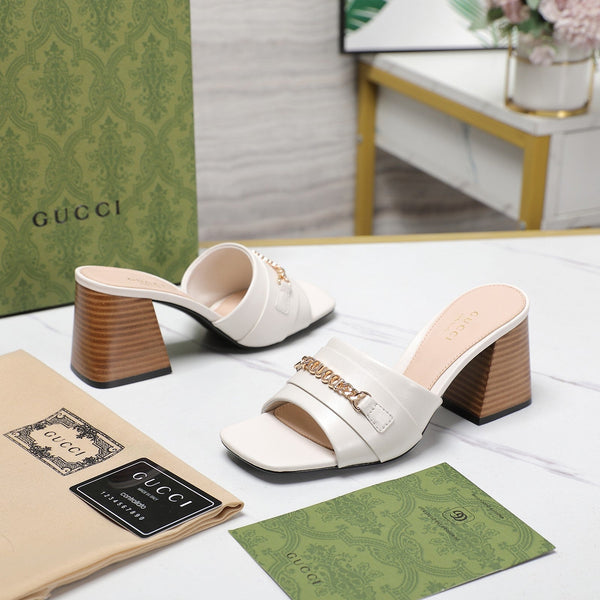 Ciabatte con tacco alto GG bianche