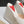 ALAIA PLATFORM WEDGE IN WHITE TAN LAMBSKIN WITH RED HEART