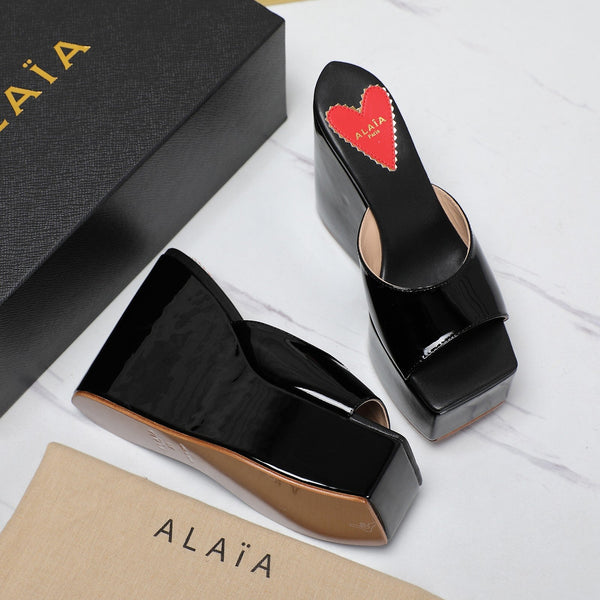 ALAIA PLATFORM WEDGE IN BLACK LAMBSKIN WITH RED HEART
