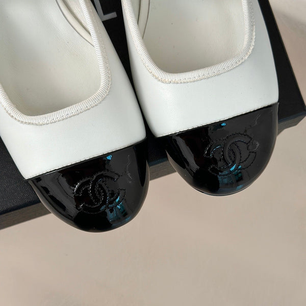 cc mule catena in pelle vitello bianco vitello verniciato nero