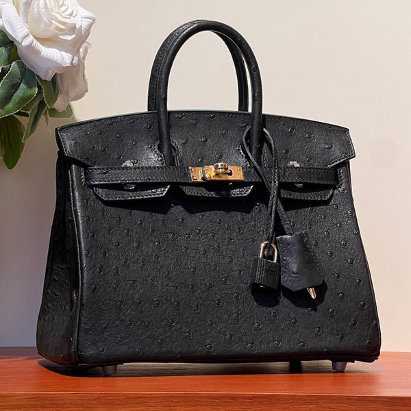 KELLY SELLIER 25 BAG IN BLACK OSTRICH LEATHER WITH GOLD HARDWARE (MADE - TO - ODER)