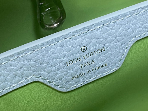 capucines mm 31.5 green taurillon leather turquoise silver hardware