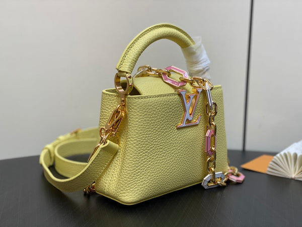 CAPUCINES MINI 21 YELLOW TAURILLON GOLD HARDWARE