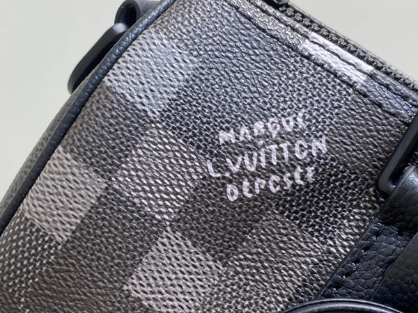 Keepall Bandouliere 25cm Damoflage Black Coated Canvas