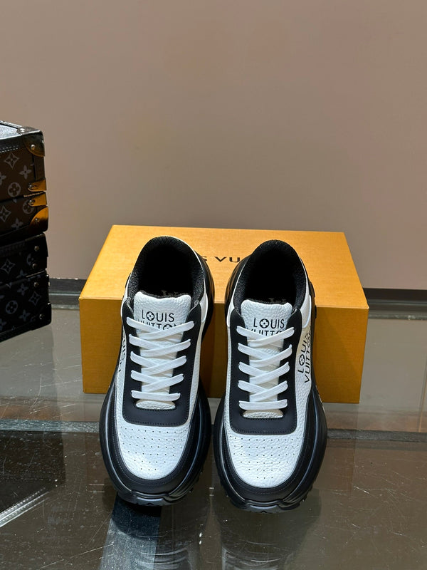 SNEAKER CON SUOLA SPESSA IN PELLE DI VITELLO NERA E BIANCA