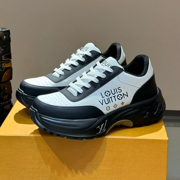 SNEAKER CON SUOLA SPESSA IN PELLE DI VITELLO NERA E BIANCA