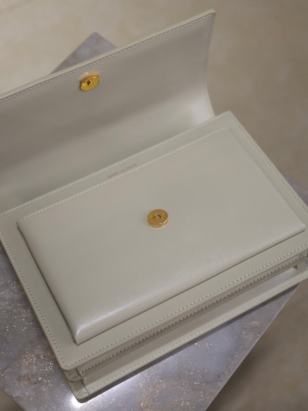 Borsa a tracolla YSL Sunset media 22 cm in pelle di vacchetta bianca