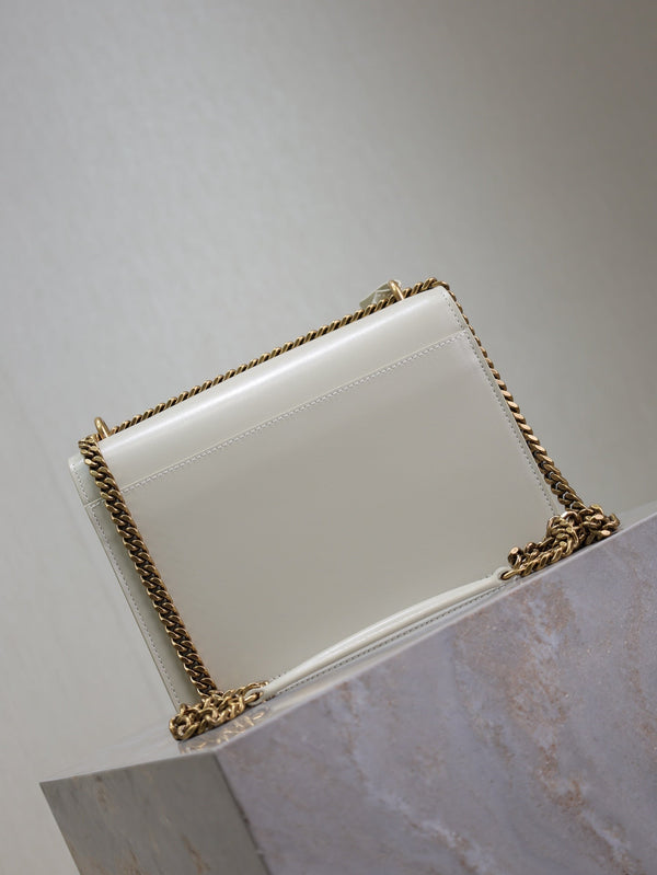 Borsa a tracolla YSL Sunset media 22 cm in pelle di vacchetta bianca