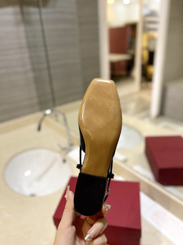 VLOGO BLACK PATENT LEATHER SLINGBACK FLATS