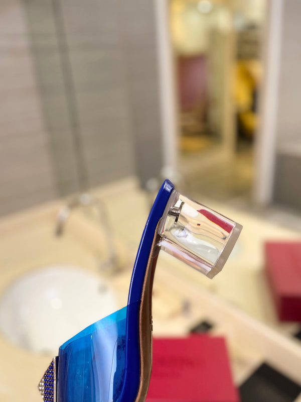 HIGH MULE 60MM IN COBALT BLUE SHEEPSKIN AND TRANSPARENT PVC