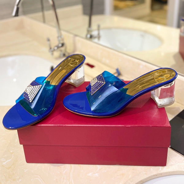 HIGH MULE 60MM IN COBALT BLUE SHEEPSKIN AND TRANSPARENT PVC