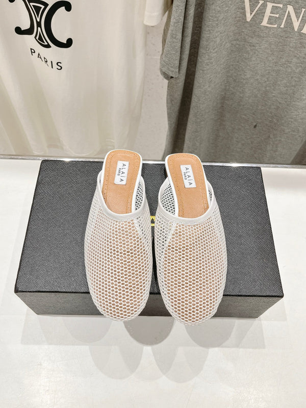 MULES ALAIA FLAT IN RETE BIANCA