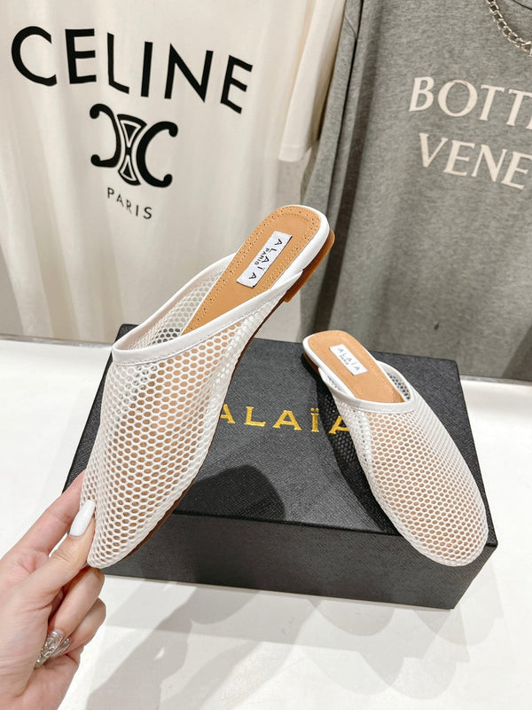MULES ALAIA FLAT IN RETE BIANCA