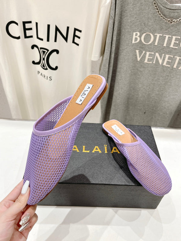 MULES PIATTI ALAIA IN RETE VIOLA CHIARO