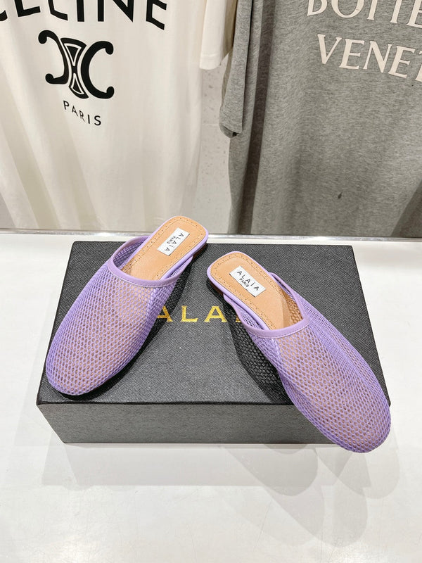 MULES PIATTI ALAIA IN RETE VIOLA CHIARO