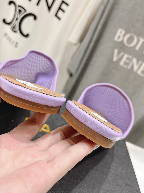 MULES PIATTI ALAIA IN RETE VIOLA CHIARO