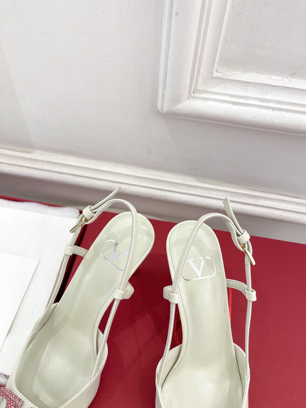 Decolleté Vlogo Signature Slingback in pelle di vitello bianca con cristalli degradati