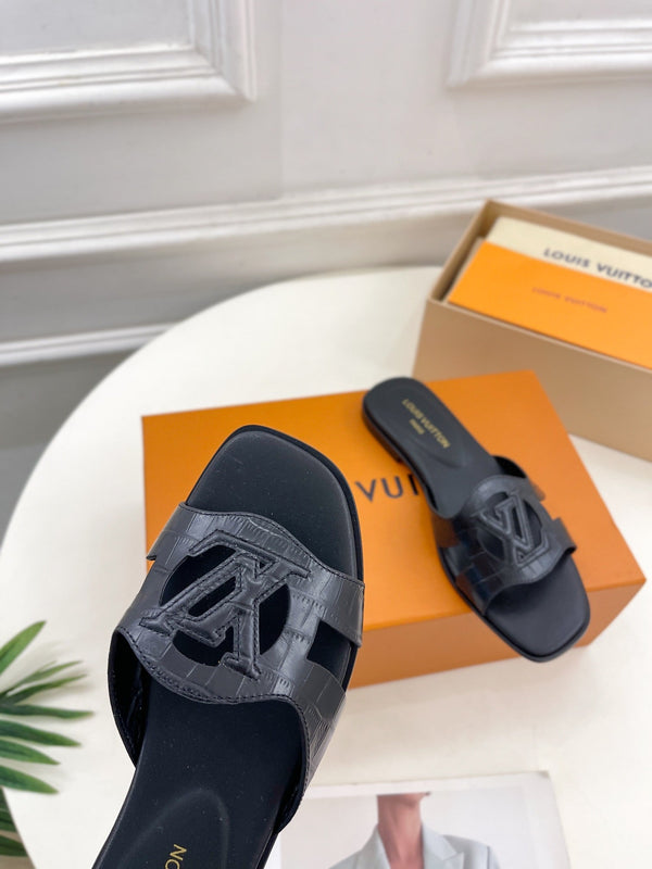 isola flat mule black calfskin